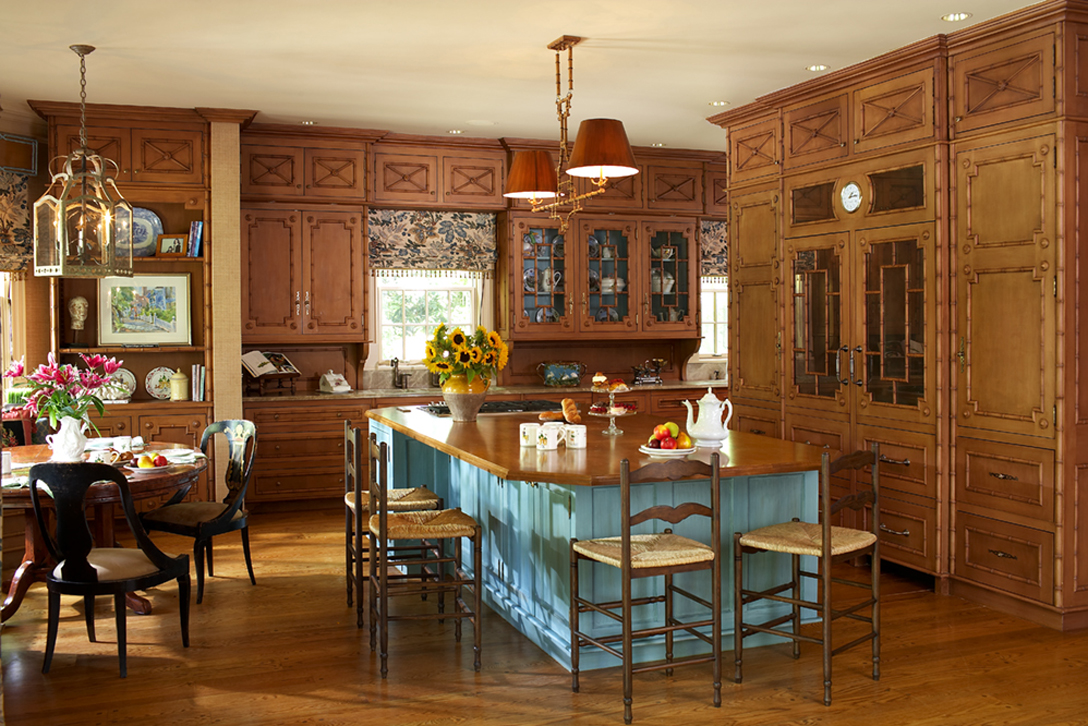 Refrigerator is behind antique mirrored glass doors. We reconfigured large space to make a better layout with less steps.  